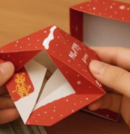 2. Fold the Panels to "Load the Pop"